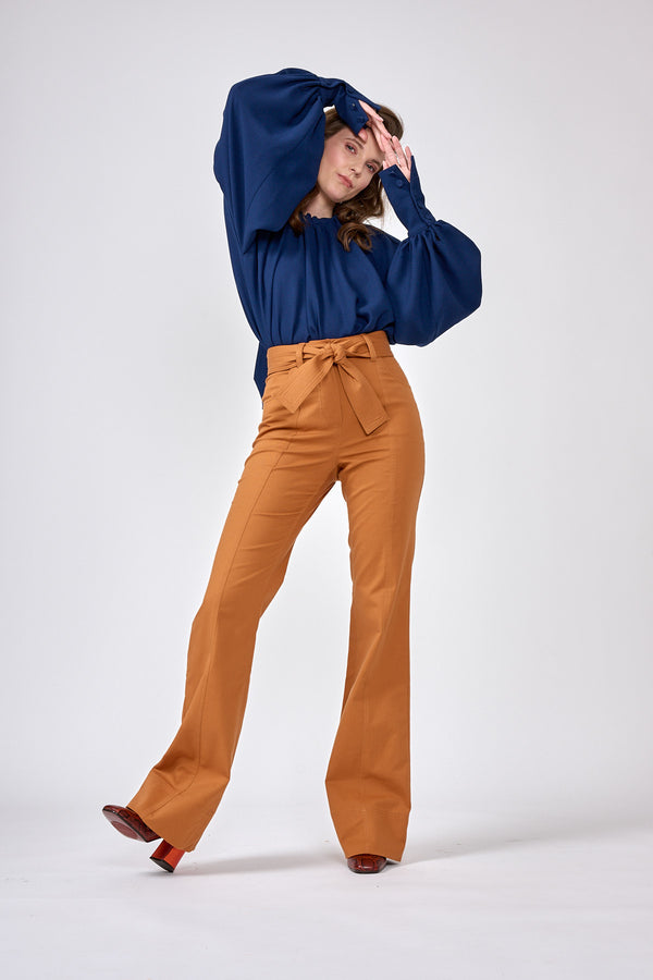 High-rise trousers with slightly flared leg and wide tie belt